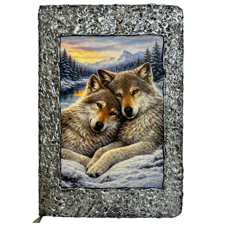 Libreta Lobos del Invierno con ilustración de dos lobos en paisaje nevado
